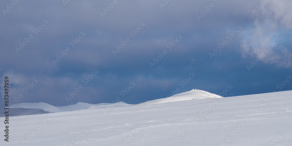 Snow-covered trees on mountain slopes. Snow-covered trees on mountain slopes.