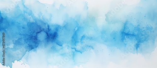 Vibrant blue ink and watercolor patterns with bursts of color on a white paper backdrop Artistic drips and gradual transitions photo