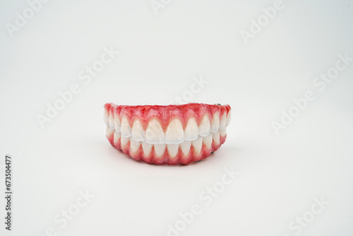 composition of dental prostheses on a white background