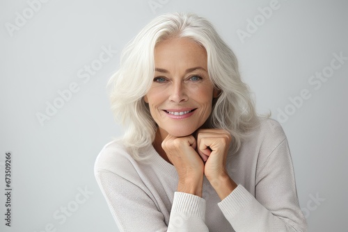 Portrait of beautiful senior woman with white hair and natural make up