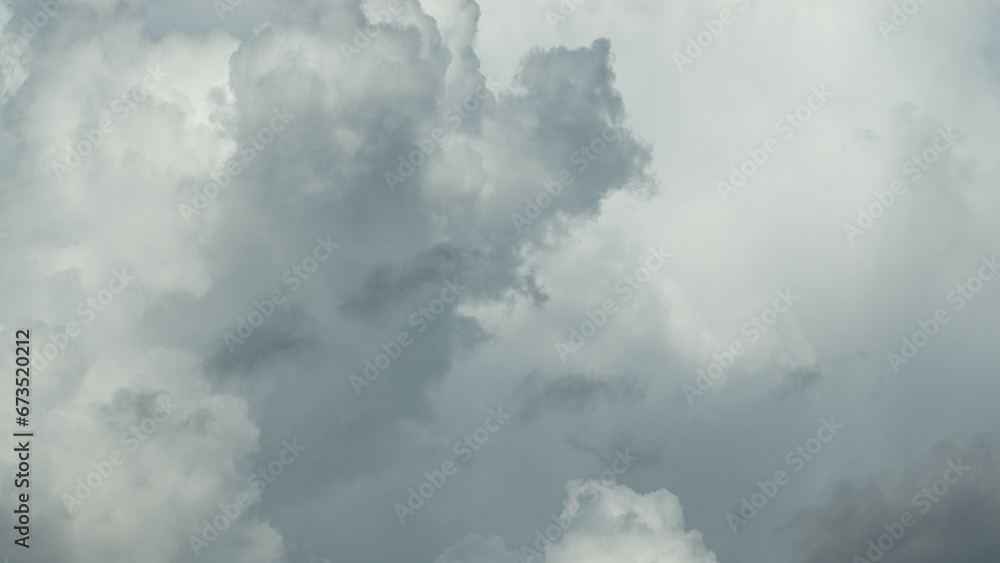 gray background, photo shows gray clouds close up