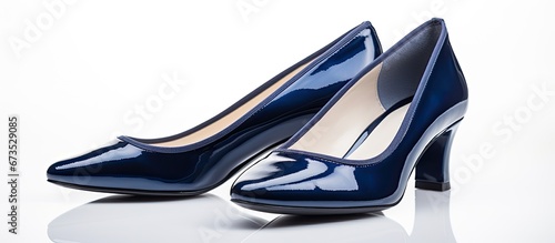 Isolated on a white background there are dark blue shoes specifically designed for women