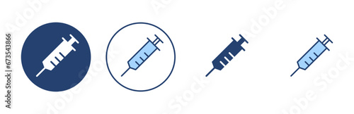 Syringe icon vector. injection sign and symbol.vaccine icon photo
