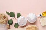 Flat lay composition with bath bombs on beige background, space for text