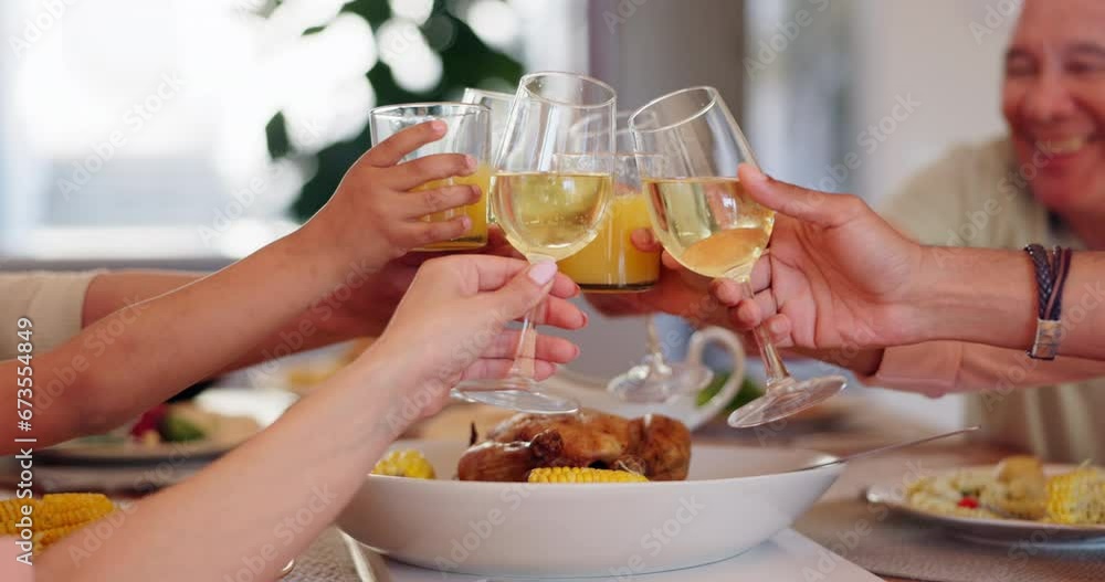 Happy family, hands and cheers for dinner celebration together with meal or support at home. Group, wine glass closeup or people by table for food, drink or bond at brunch with smile, care or toast Happy family, hands and cheers for dinner celebration together with meal or support at home. Group, wine glass closeup or people by table for food, drink or bond at brunch with smile, care or toast