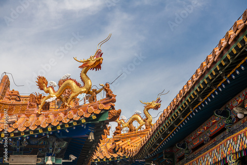 The dragons decorations on the roof of Da Zhao or Wuliang temple, China photo