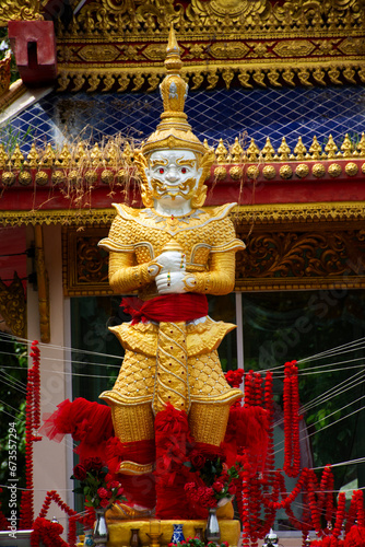 King Thao Wessuwan or Vasavana Kuvera giant statue of Wat Muang temple thai people travelers travel visit and respect praying blessing wish holy mystery worship at Angthong city in Ang Thong, Thailand