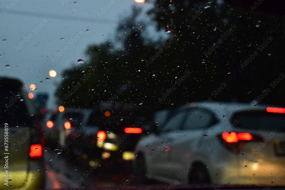traffic jam on the road in night with rain, defocused background traffic jam on the road in night with rain, defocused background