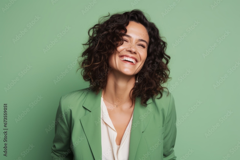 Portrait of beautiful young woman with curly hair smiling at camera. Portrait of beautiful young woman with curly hair smiling at camera.