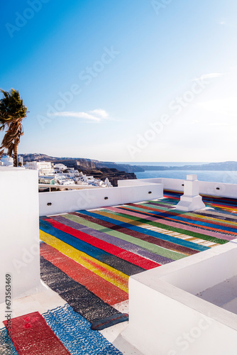 Rainbow colored rooftop in Santorini, Greece © Martin