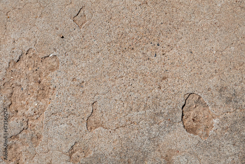 Εκτύπωση καμβά Macro image of a section of weathered  concrete floor with cracks and pock marks