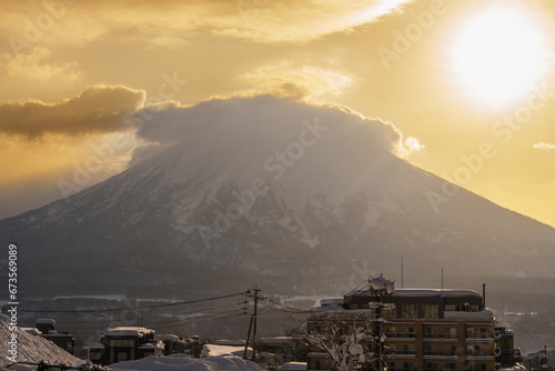 Beautiful Yotei Mountain with Snow in winter season at Niseko. landmark and popular for Ski and Snowboarding tourists attractions in Hokkaido, Japan. Travel and Vacation concept photo