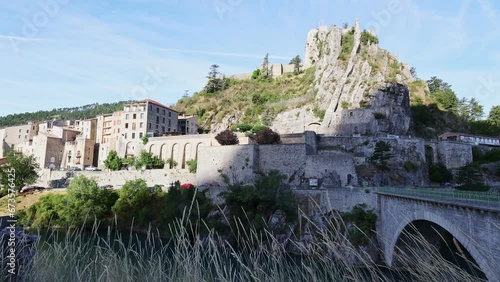 France, Sisteron commune with its ancient stone houses and natural green and rocky surrounding