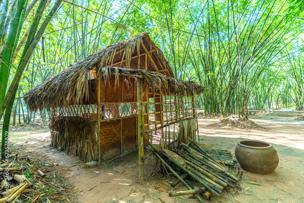Temporary accommodation or hut in the green bamboo forest. Temporary accommodation or hut in the green bamboo forest.