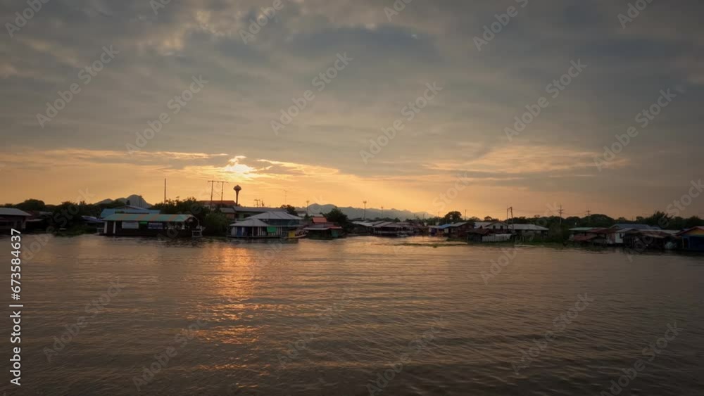 Kanchanaburi Golden Hour Sunset Timelapse Video Over The River Kwai In Thailand. Kanchanaburi Golden Hour Sunset Timelapse Video Over The River Kwai In Thailand.