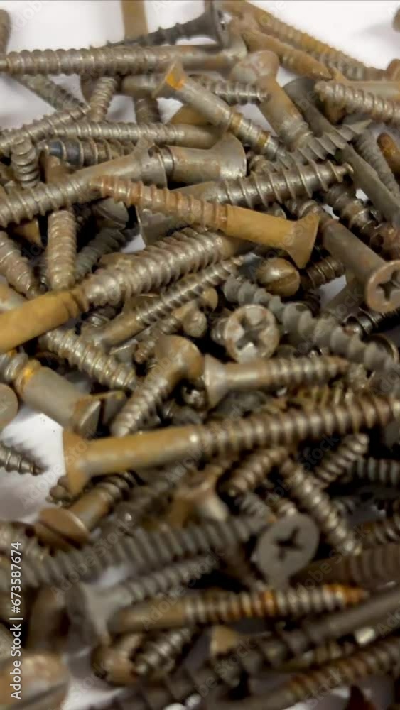 Video Stock a rusted screws pile rusty spinning video old screw rotate