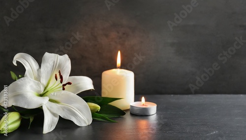 Eternal Remembrance: Lily and Candle on Dark Background