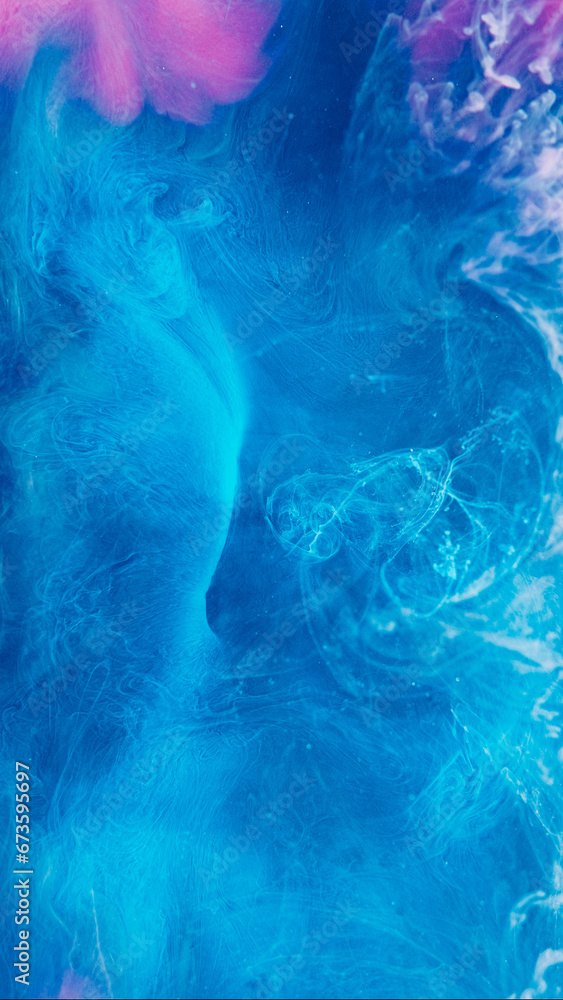 Mysterious fume background. Magic steam. Blue pink water paint mix hypnotic ethereal spreading in captivating colorful liquid ink creative art.