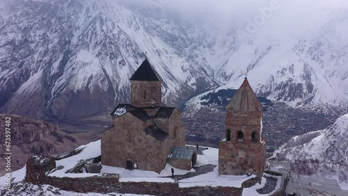 Wallpaper Mural Picturesque view of Holy Trinity Church near the village of Gergeti in Georgia Torontodigital.ca