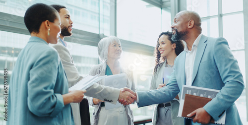 Business people, handshake and meeting in b2b, agreement or deal for teamwork or growth at office. Businessman shaking hands with woman in recruiting for team introduction, greeting or partnership