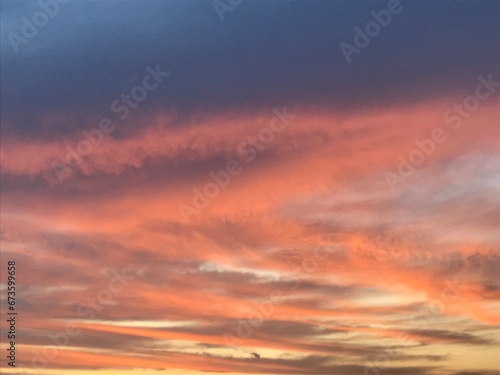 red sunset sky on a fine day in full frame shot © Hathairat