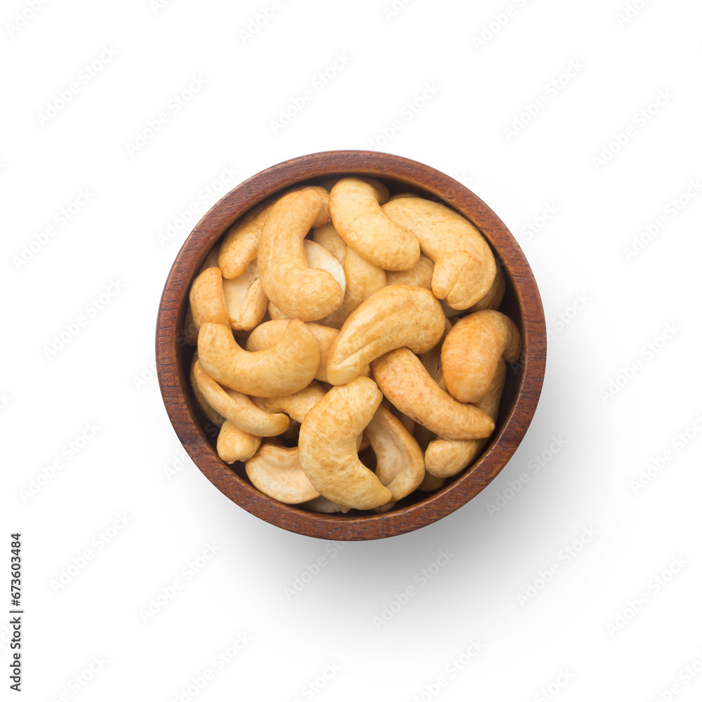Fried cashew nuts in wooden bowl isolated on white background , top view , flat lay. Fried cashew nuts in wooden bowl isolated on white background , top view , flat lay.
