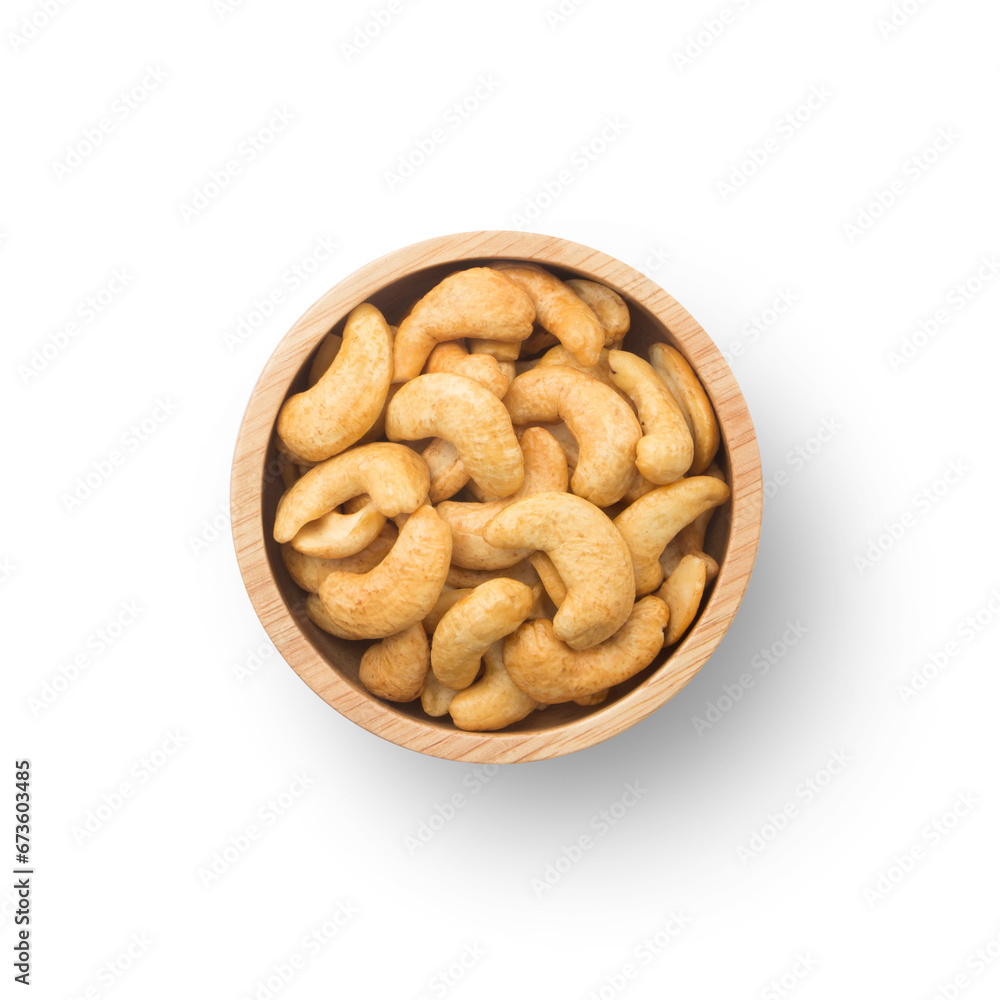 Fried cashew nuts in wooden bowl isolated on white background , top view , flat lay. Fried cashew nuts in wooden bowl isolated on white background , top view , flat lay.