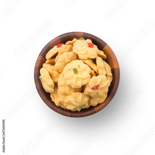 Mini cookies in wooden bowl isolated on white background , top view , flat lay.