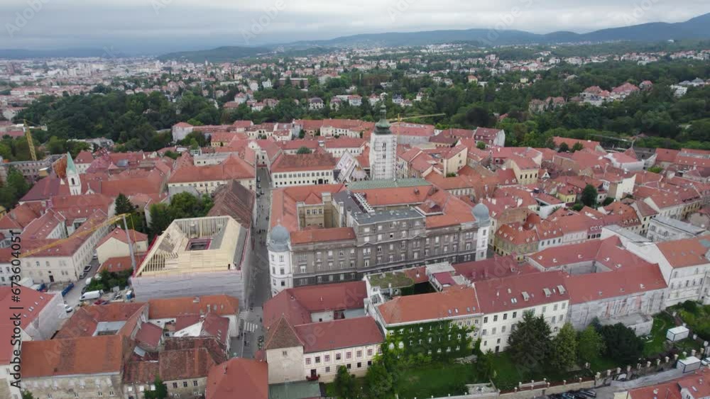 Saint Mark's Church in forested city center of Zagreb Croatia, aerial parallax Saint Mark's Church in forested city center of Zagreb Croatia, aerial parallax