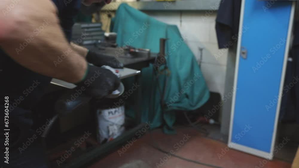 Sheet metal saw making adjustments with sparks Sheet metal saw making adjustments with sparks