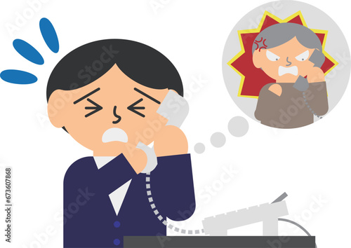 苦情の電話の受ける男性のイメージ素材