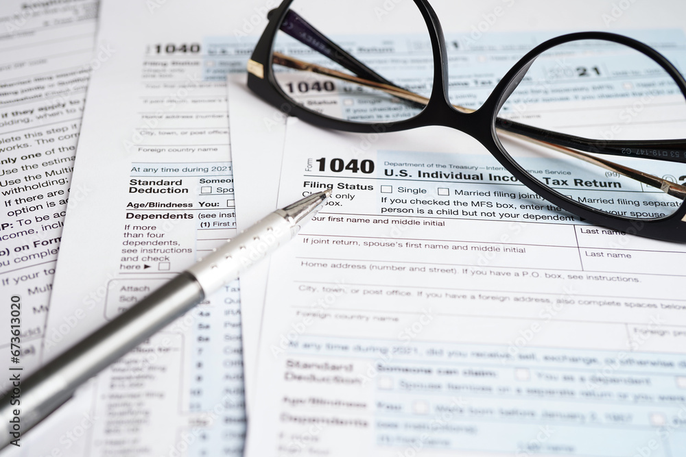 Tax form 1040 U.S. Individual Income Tax Return, business finance concept. Tax form 1040 U.S. Individual Income Tax Return, business finance concept.