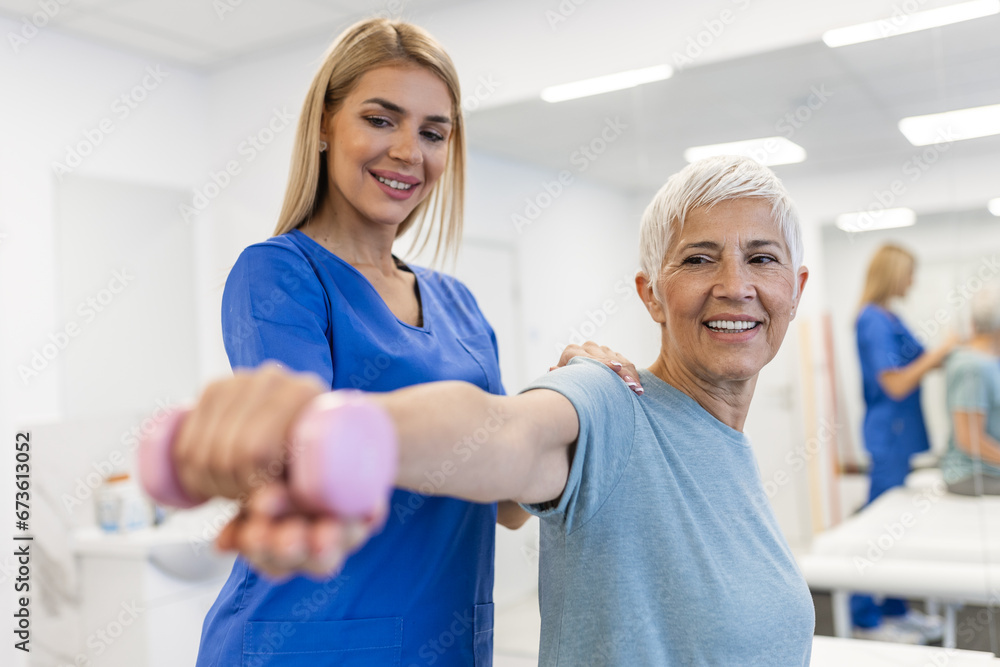 Obraz premium Professional therapists is stretching muscles, senior patient with abnormal muscular symptoms, physical rehabilitation therapies and treatment of physiological disorders by physiotherapists concept.