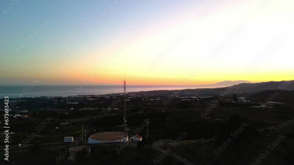 Aerial drone rotating shot over an Observatory in Pego town, Alicante, Spain at dusk. Aerial drone rotating shot over an Observatory in Pego town, Alicante, Spain at dusk.