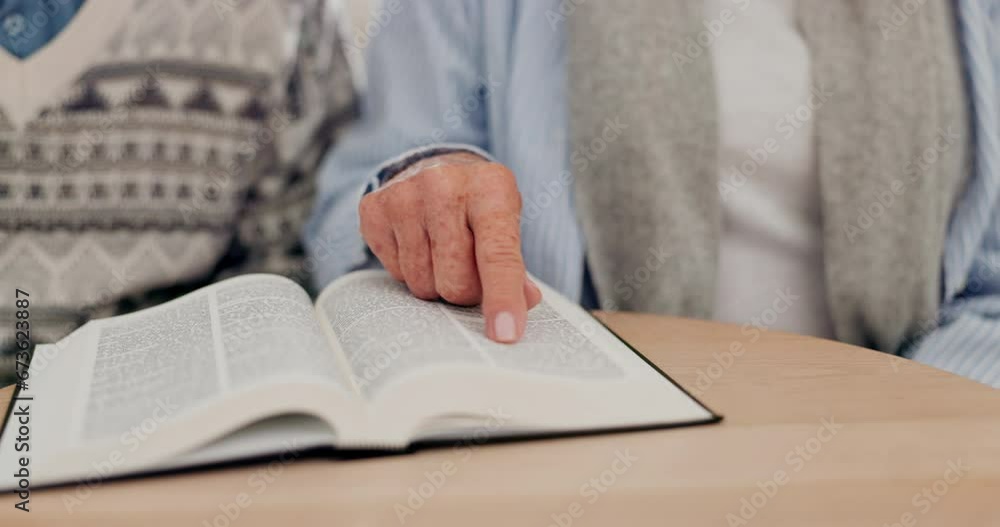 Man, hand and bible study on table with priest with religion book, spiritual growth or hope prayer in home. People, god or christian reading for worship or healing, jesus christ or learning in house Man, hand and bible study on table with priest with religion book, spiritual growth or hope prayer in home. People, god or christian reading for worship or healing, jesus christ or learning in house