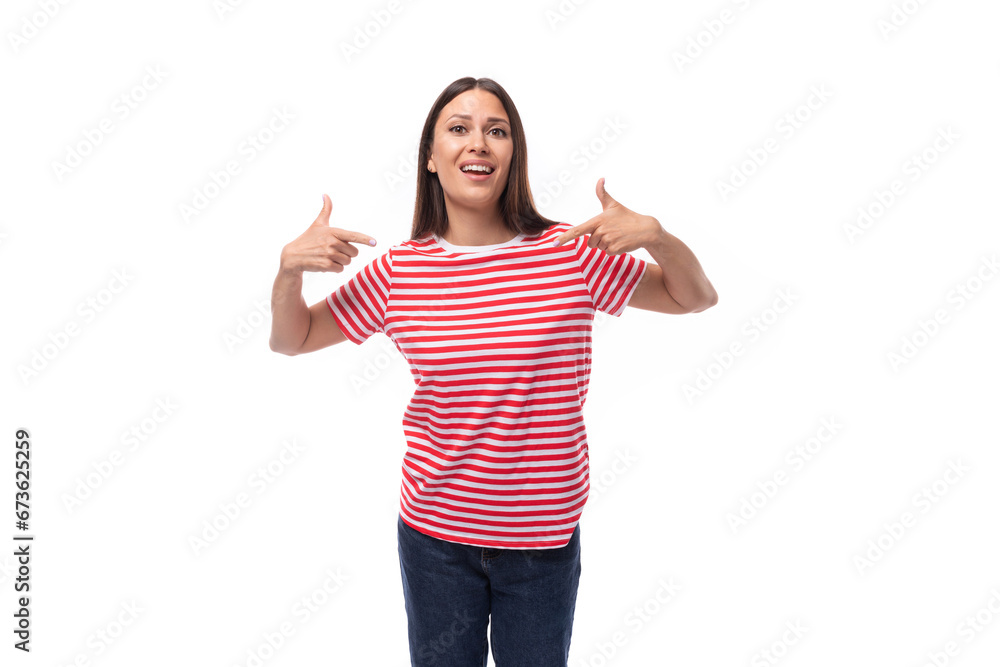 young pretty smiling european woman with straight black hair is wearing a striped red t-shirt young pretty smiling european woman with straight black hair is wearing a striped red t-shirt