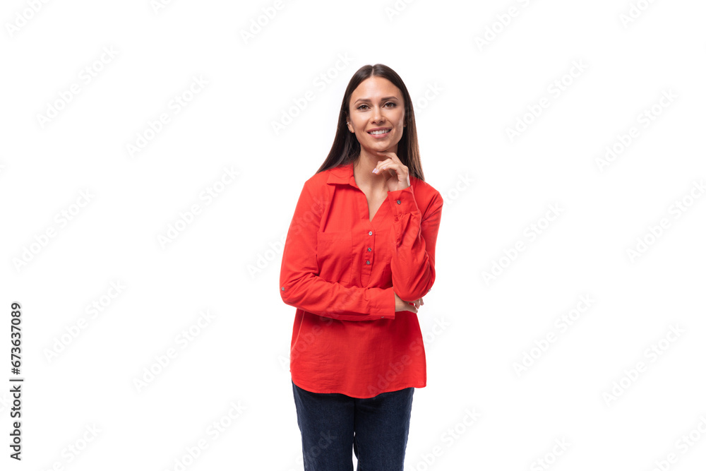 young caucasian model woman with straight black hair dressed in a red blouse on a white background young caucasian model woman with straight black hair dressed in a red blouse on a white background