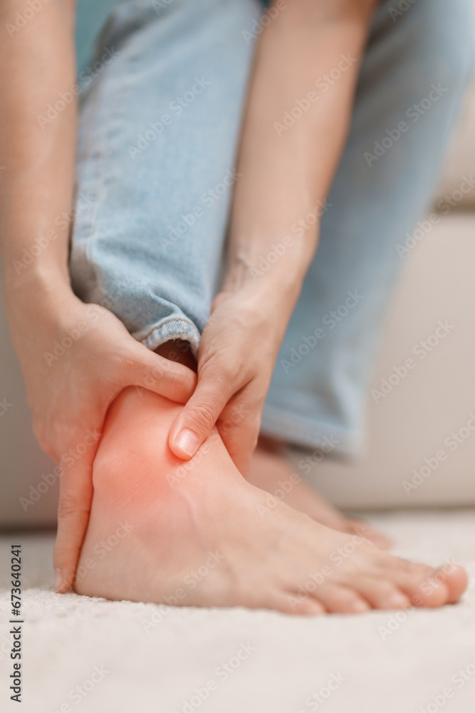 woman having leg pain due to Ankle Sprains or Achilles Tendonitis and Shin Splints ache. injuries, health and medical concept