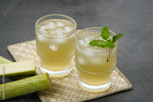 Fresh sugar cane juice (Es Tebu) in glass. Indonesian drink. 