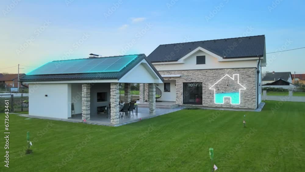Picture of Smart home with rooftop solar panel and animation logo of renewable ...
