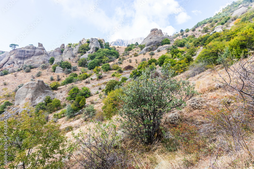 Mysterious mountain landscape of the Valley of Ghosts on the western slope of Mount Demerdzhi in Crimea. Popular tourism and trekking destination