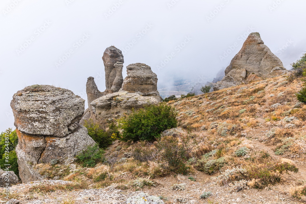 Mysterious mountain landscape of the Valley of Ghosts, a cluster of strangely shaped rocks on the western slope of Mount Demerdzhi in Crimea