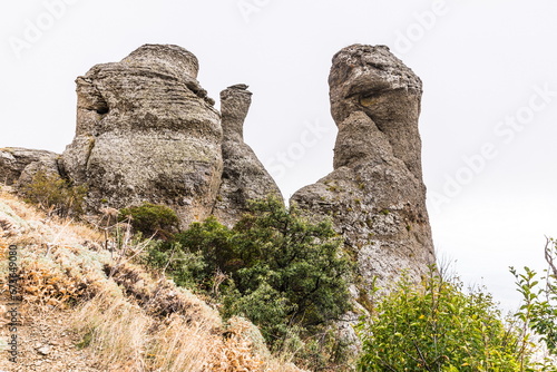 Mysterious mountain landscape of the Valley of Ghosts, a cluster of strangely shaped rocks on the western slope of Mount Demerdzhi in Crimea © dadamira