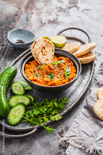 Homemade vegan Harissa carror and lentil spread with flatbread