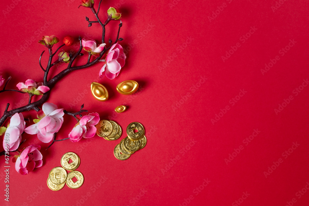 Traditional chinese coins, chinese new year concept, on red background.