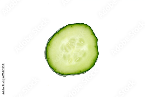 Sliced cucumber top view on white background. Healthy food concept