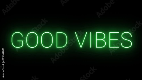 Flickering neon green glowing good vibes sign animated black background	 photo