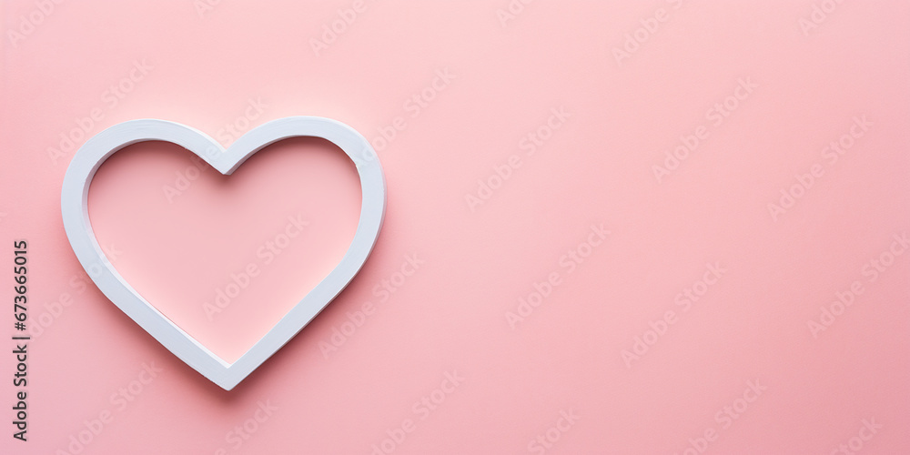 A pastel pink background with a heart-shaped chalkboard, perfect for writing love notes.