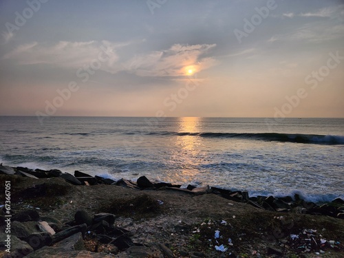 Puducherry, India - Oct 17 2023: Sun rise at Rock Beach in Pondicherry. © Ashish Sharma