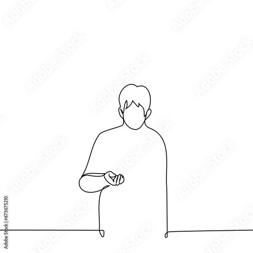 man stands with an outstretched hand or looks at a change in his hand - one line art vector. concept begging, counting change